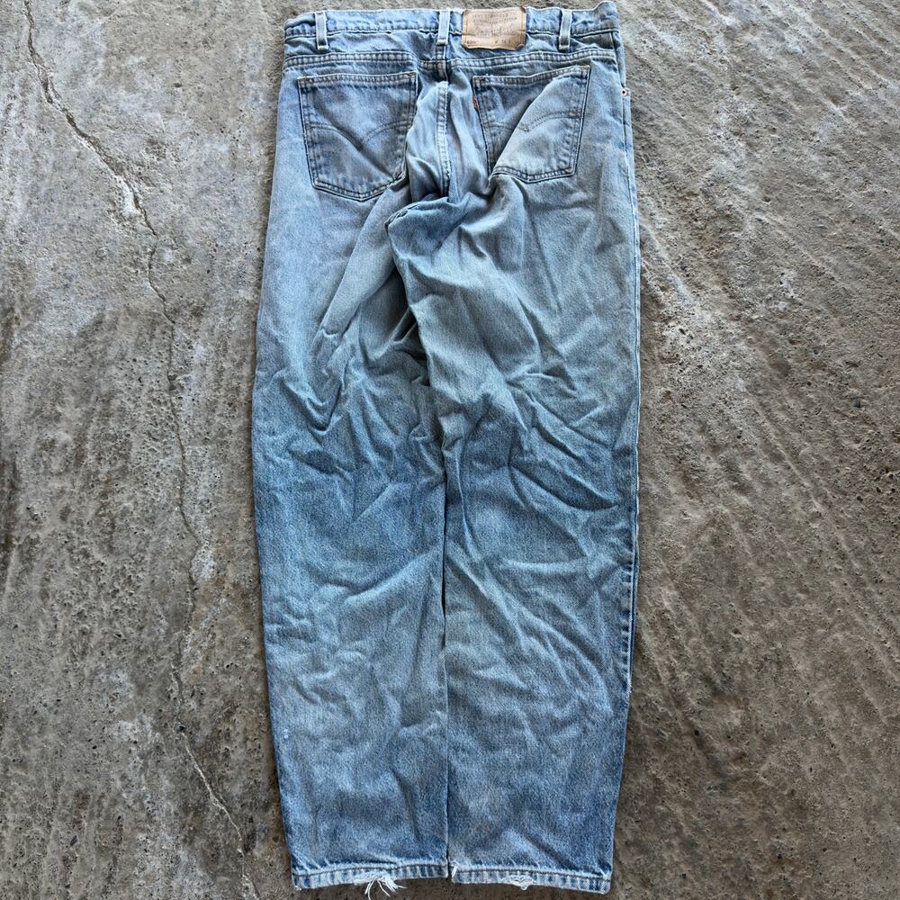 Vintage 90s Levi's 550 Jeans Denim Ripped Patina Lightwash Fits 32x29